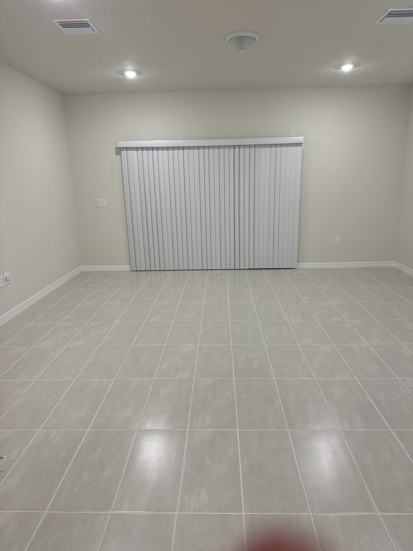 Freshly painted interior living room with tile flooring